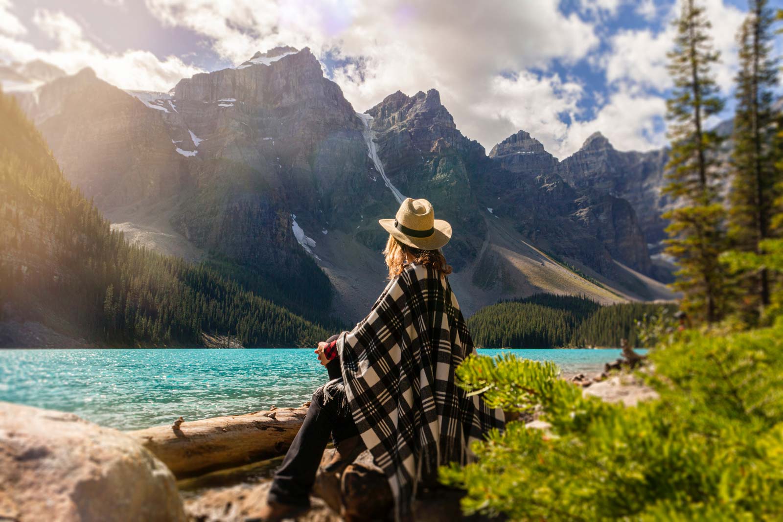 Woman Sitting at Lake