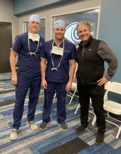 Drs. Waite and Parkhurst and another dr. stand together and smile for the camera